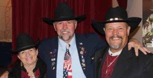 Lodge 1704 Exalted Ruler Steve McBride, center, greets outgoing Elk State President Lee Butts and his wife Ruth at the Nevada State Elks covention last weekend in Hawthorne.