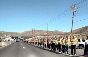 Photos courtesy of Mineral County Sheriff Randy Adams NDOT workers join officers and many others to honor the life of Carson City Sheriff Deputy Carl Howell as his funeral procession made its way to Reno last Thursday. Howell was gunned down on Aug. 15 responding to a domestic violence call in the state capital.