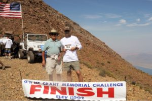 Courtesy photo -  Ed Gallegos and Lt. Col. Gregory Gibbons at the finish line of the 2015 9/11 Memorial Mt. Grant Challenge. 